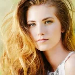 Healthy 2A hair with soft beachy waves and a lightweight polished finish