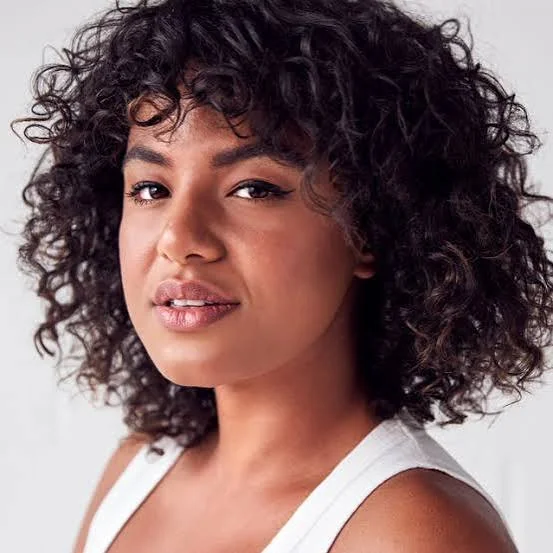 2A hair styled with lightweight mousse for soft defined waves and volume