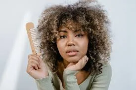 4C hair detangling with conditioner and a wide tooth comb in organized sections