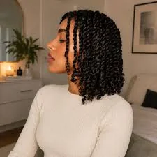 4C hair in a low manipulation protective style with natural textured coils and a neat finish